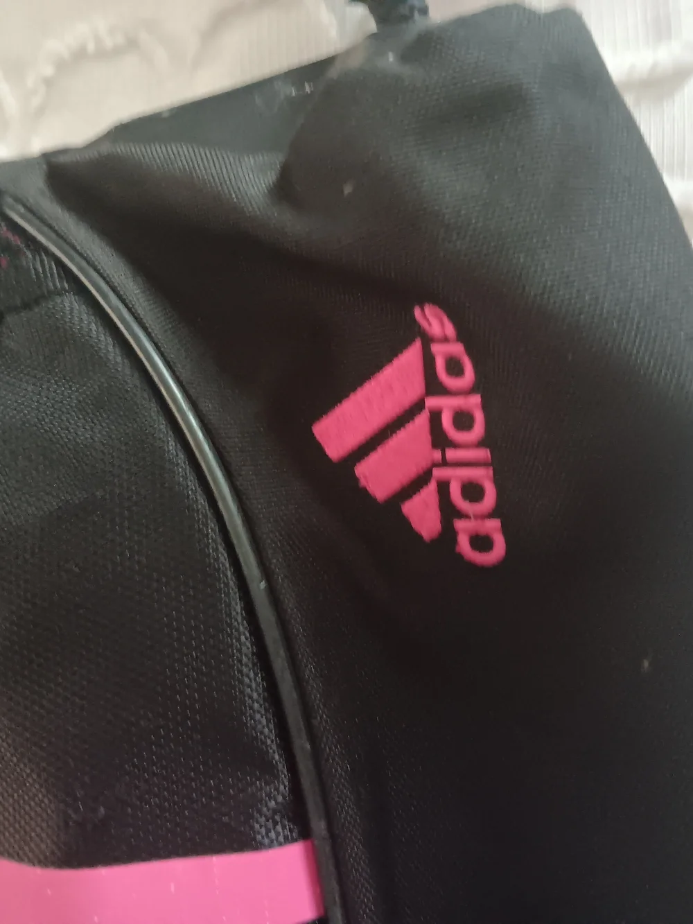 adidas Black Drawstring Backpack with Pink Three-Stripes
